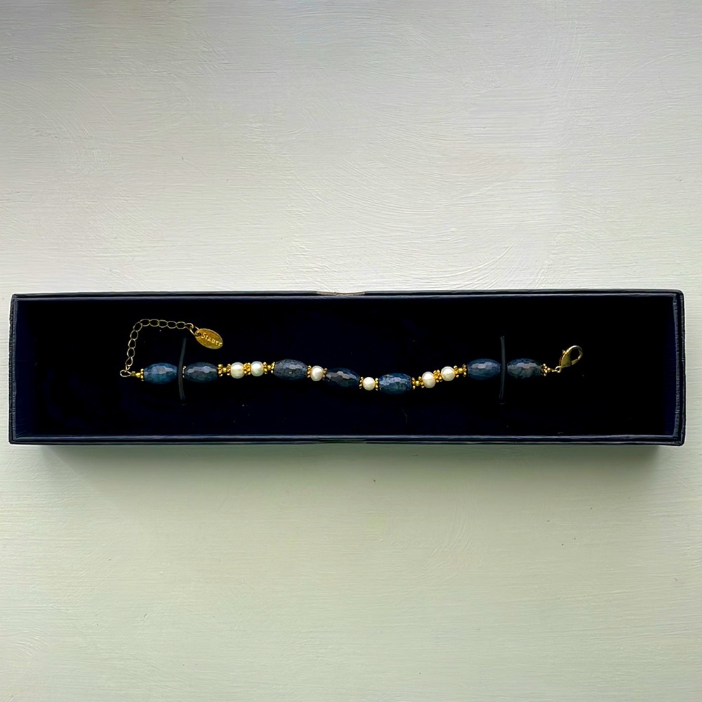Blue beads and pearl bracelet.